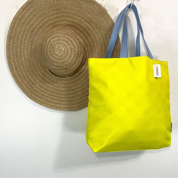 Clinique Handbags - NWT - Clinique Carry All Bag in Yellow and Blue